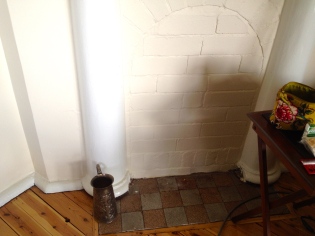 The fireplace in the lounge room has been bricked in for many years but will soon be reopened.